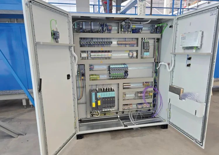 Intelligent annealing lehr integrated with a glass forming machine